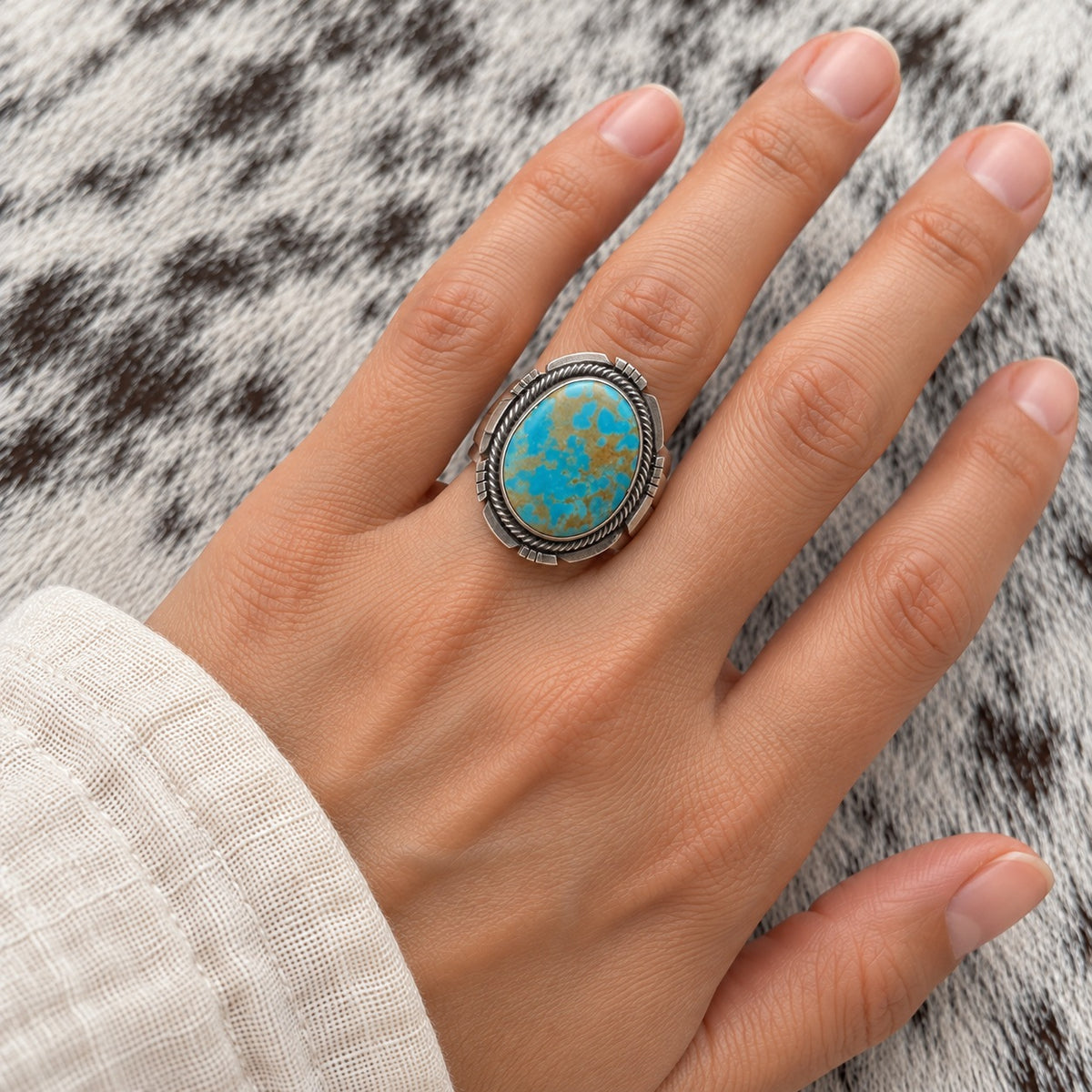 Jameson Garcia Turquoise Mine 8 Ring worn around a finger; approximate scale