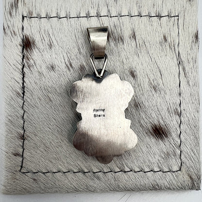 Back of the pendant stamped Sheila and Sterling, the artist's hallmark