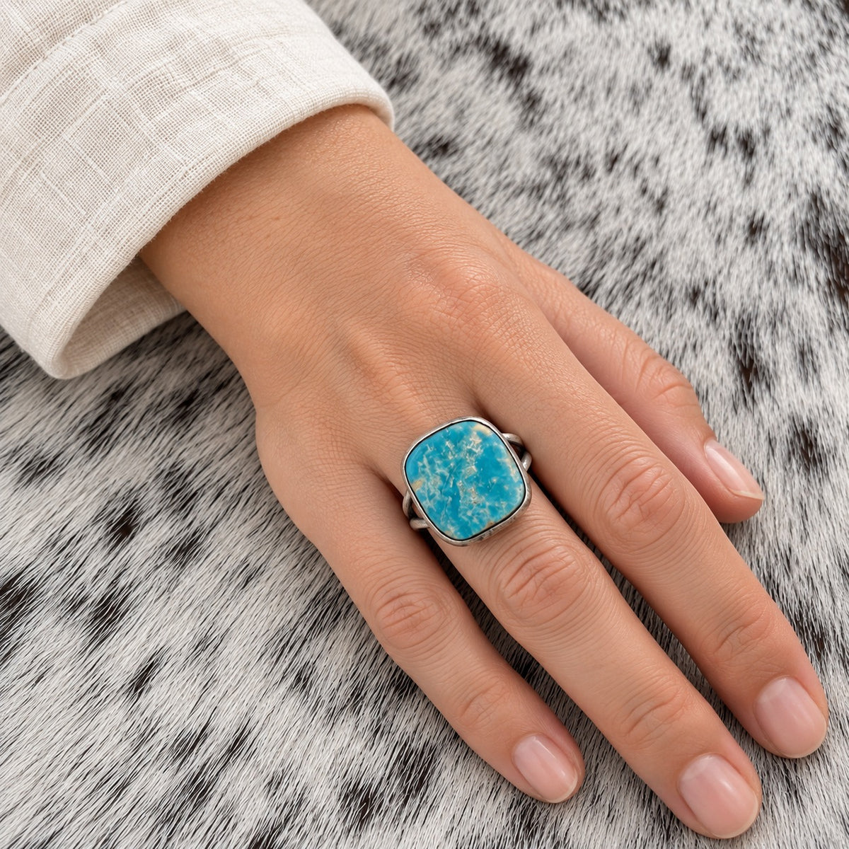 Freeform Turquoise Ring by Sheila Tso — worn on an adult hand; approximate scale
