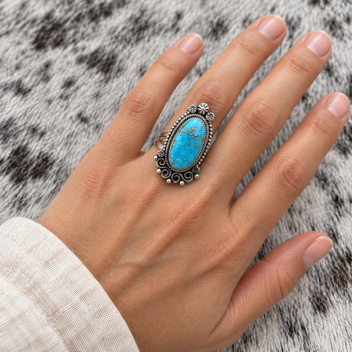 Kingman Turquoise Ring — lifestyle worn around a finger; approximate scale