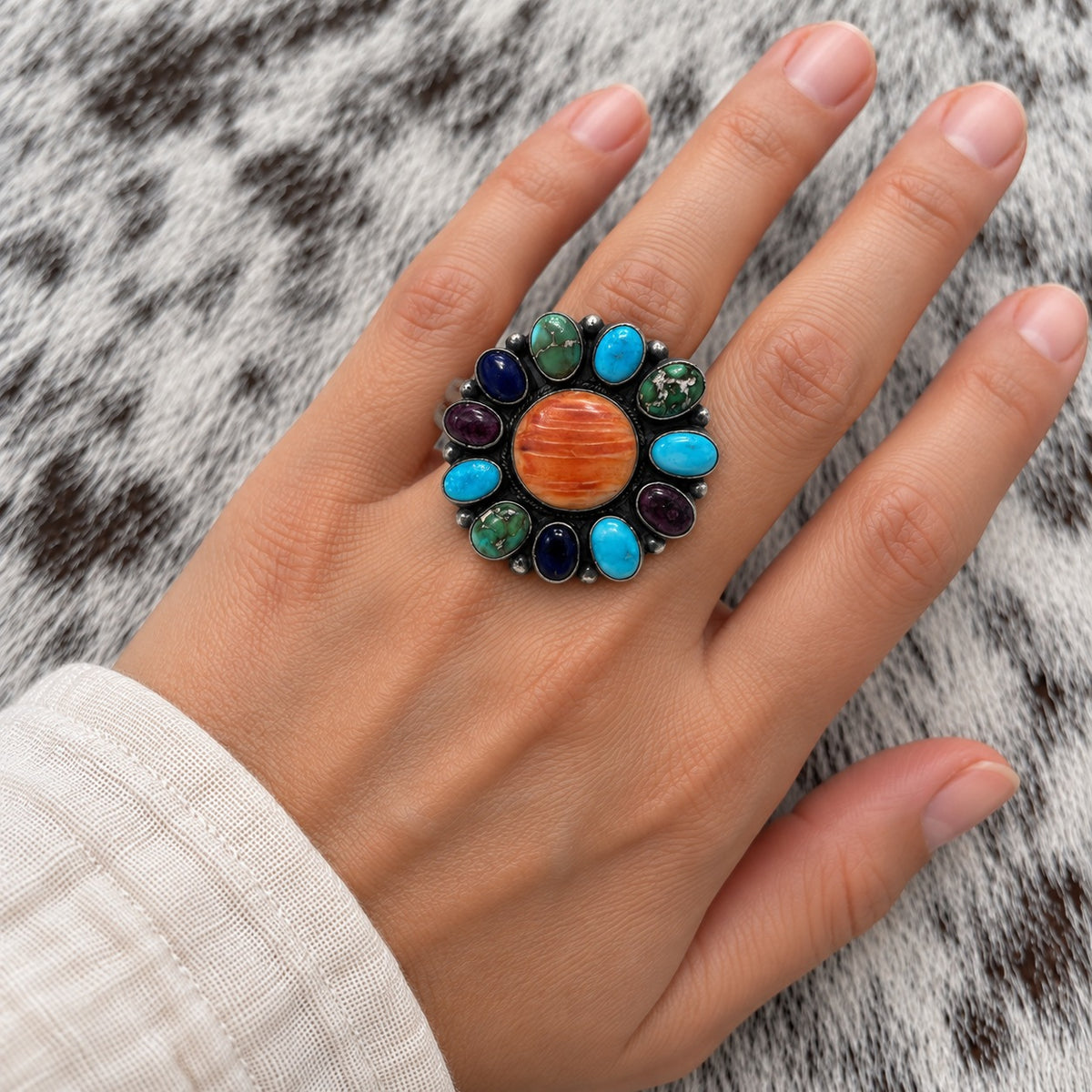 Multi Stone Turquoise, Spiny Oyster and Lapis Cluster Rings — lifestyle worn around a finger; approximate scale