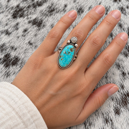 Sierra Nevada Turquoise Tear Ring worn around a finger; approximate scale