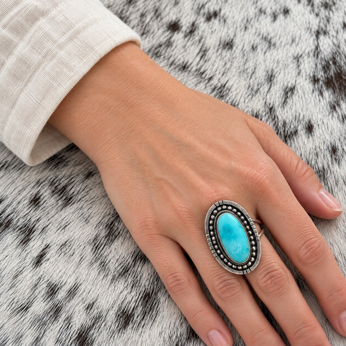 Sonoran Turquoise Oval Ring by Dan Benally — lifestyle (approximate worn scale)
