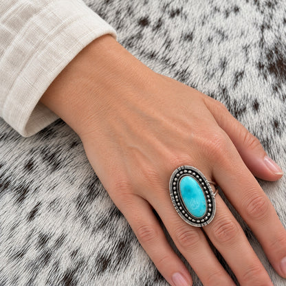 Sonoran Turquoise Oval Ring by Dan Benally — lifestyle (approximate worn scale)