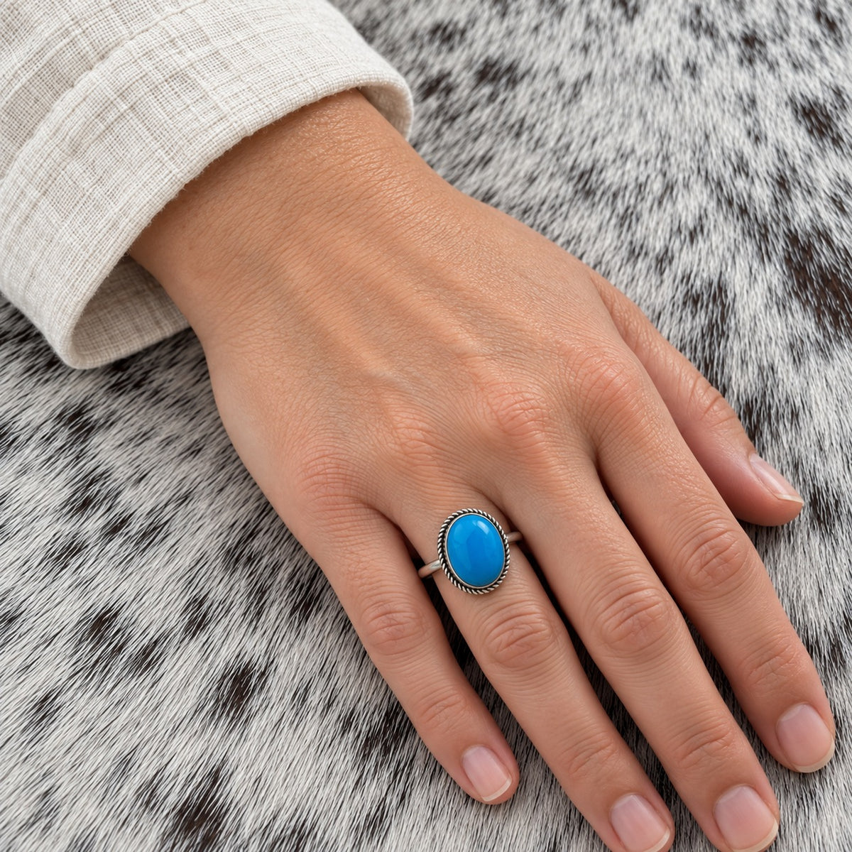 Turquoise Classic Oval Ring worn on an adult hand; approximate scale